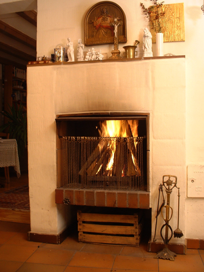 Open fireplace with icon; photo courtesy Klaus Mueller